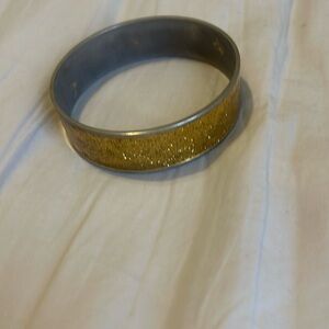 Gold cuff bangle